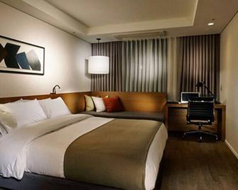 Ramada by Wyndham Gunsan - Gunsan - Bedroom