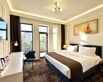 Garnet Hotel Tashkent - 塔什干 - 臥室