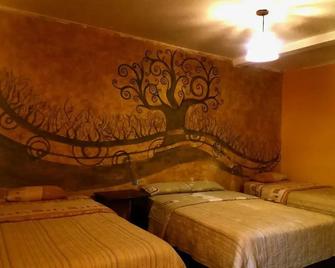 Los Ríos Hotel - Baños - Schlafzimmer