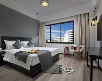 Wonder Land Hotel (Kunming Railway Station) - Kunming - Slaapkamer