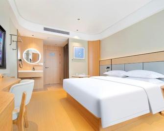 Qingxin Hotel - Enshi - Habitación