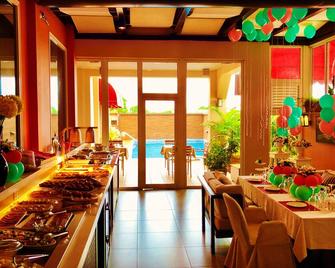 Home Suites Boutique Hotel - פריטאון - מסעדה