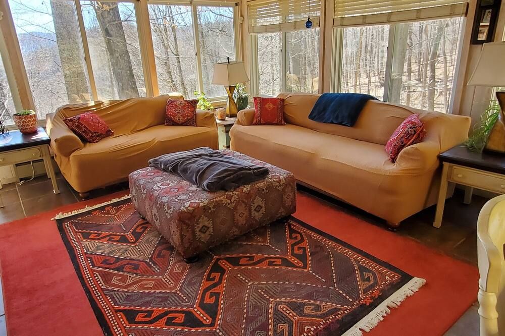 Living room view of Treehouse Cathedral In Blue Ridge Mounta