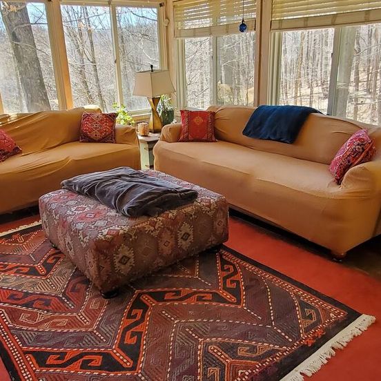 Living room view of Treehouse Cathedral In Blue Ridge Mounta