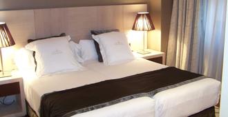 Washington Parquesol Suites & Hotel - Valladolid - Sypialnia