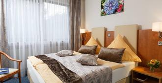 Hotel Am Sonnenhang - Kassel - Bedroom