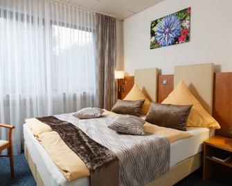 Hotel Am Sonnenhang - Kassel - Phòng ngủ