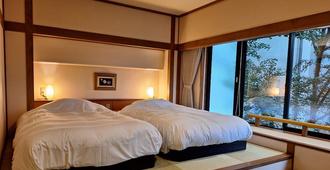 Takinoyu Hotel - Tendō - Slaapkamer