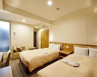 Unizo Inn Tokyo Kandaeki-West - Tokyo - Bedroom