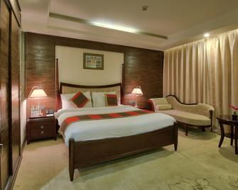 Polo Inn & Suites - Jaipur - Bedroom