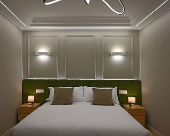 Mom Apartment Rooms&Suites - Tivoli - Bedroom