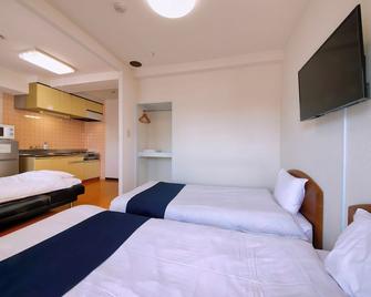 Hotel Nishikawaguchi Weekly - Kawaguchi - Schlafzimmer