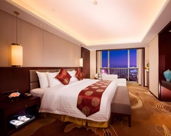 New Century Grand Hotel Xi'an Xizang Building - Xi'an - Habitación