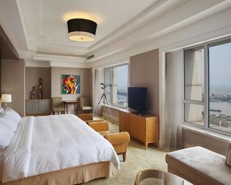 Friend Plaza Hotel - Dandong - Schlafzimmer