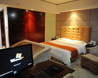 Wuhan Sentai Zhongyang Hotel - Wuhan - Bedroom