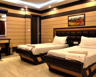 Hotel Esteem - כלכולתה - חדר שינה