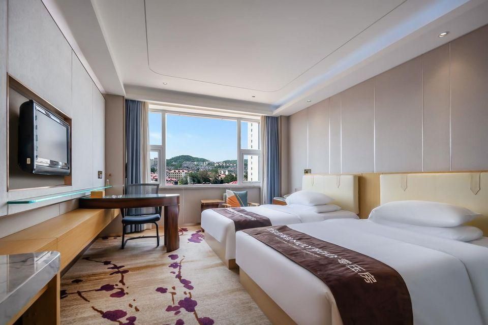 Asia Hotel Yantai - יאנטאי - חדר שינה