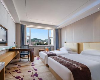 Asia Hotel Yantai - יאנטאי - חדר שינה