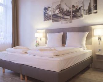 Hotel Schugt - Pulheim - Slaapkamer