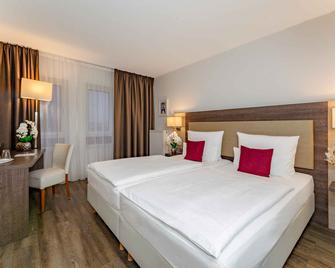 Plaza Inn Karlsruhe Nord - Karlsruhe - Bedroom