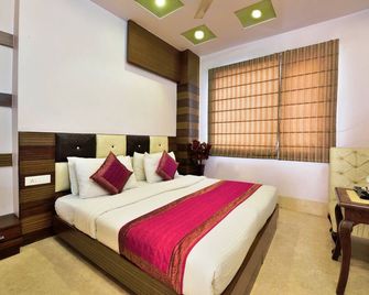 Hotel Taksh Inn - New Delhi - Bedroom