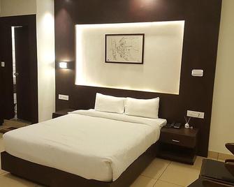 Hotel Orbis - Bengaluru - Bedroom