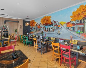 Gästehaus am Wasserpark - Rust - Restaurant