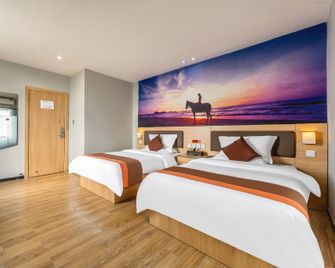 Heyue Hotel (Zhanjiang Suixi Quanfeng Central Plaza Branch) - Zhanjiang - Habitación
