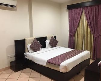 Taleen AlMalaz hotel apartments - Riyadh - Bedroom