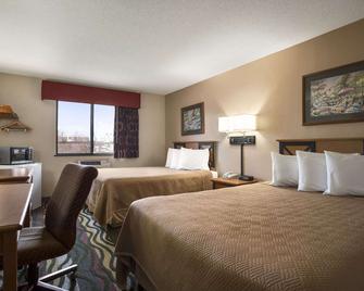 Travelodge by Wyndham Battle Creek - Battle Creek - Bedroom