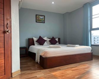 Tna Hotel - Vang Vieng - Bedroom