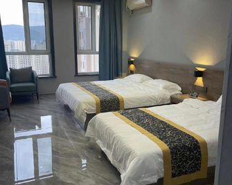Lanzhou Meet homestay (Haihong Unexpectedly Home Store) - Lanzhou - Bedroom