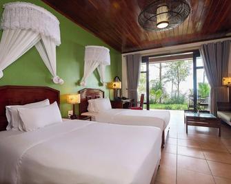 Lang Co Beach Resort - Phu Loc - Schlafzimmer