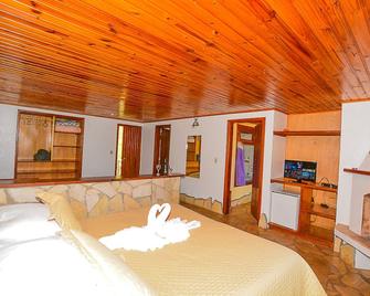 Hotel Cabeca de Boi - Monte Verde - חדר שינה