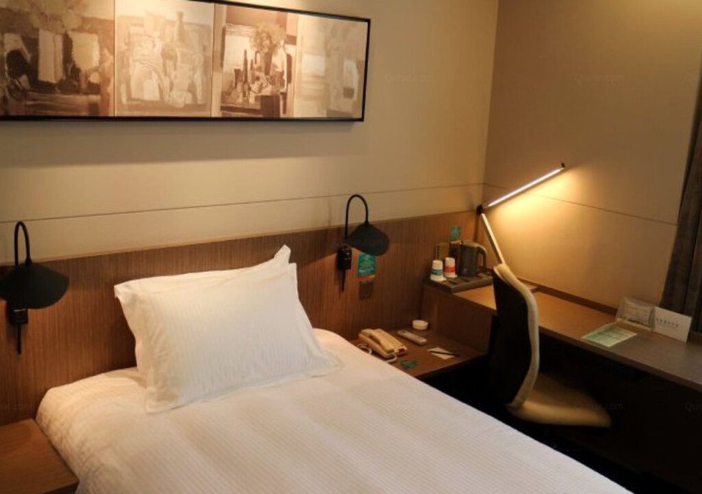 Jinjiang Inn Pinshang Xining Wusi West Road New Hualian Squire Branch - Xining - Camera da letto