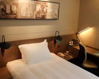 Jinjiang Inn Pinshang Xining Wusi West Road New Hualian Squire Branch - Xining - Camera da letto