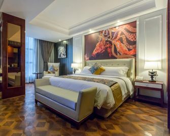 Duhem Century Hotel - Mianyang - Schlafzimmer
