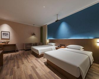 Xing Chen Hotel (Urumqi Railway Bureau Metro Station) - Ürümqi - Bedroom