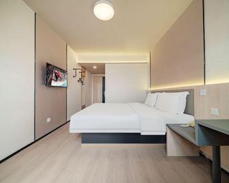 Jinjiang Inn Nantong Tongzhou Jianshe Road - Nantong - Bedroom