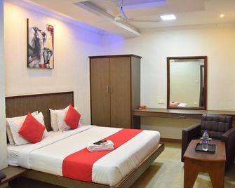 SS Hotels - Tiruppur - Habitación