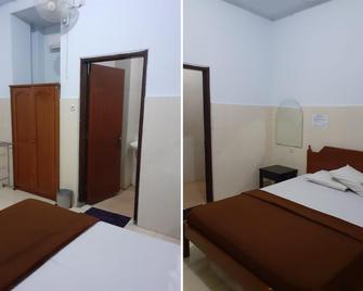 OYO 2709 Kos Cirendeu - Pamulang - Habitación