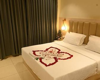 Hotel Shree Ji Inn - Райпур - Спальня