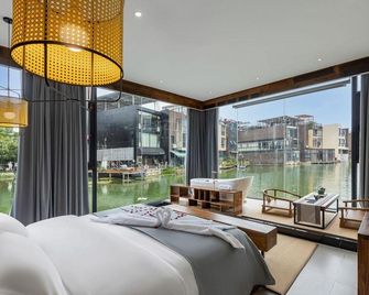 Changsha Huaxi Shuishe Homestay (Zhongnan University Sunshine 100 Branch) - Changsha - Habitación