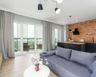 Family Apartment Lake Malta by Noclegi Renters - Poznan - Phòng khách