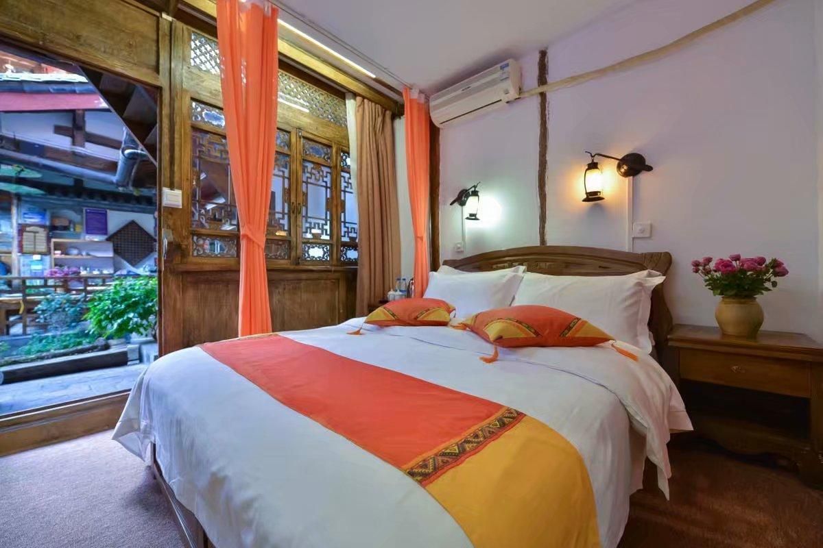Lijiang Liyuanju Inn - ליז'יאנג - חדר שינה
