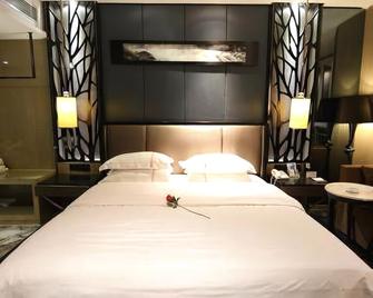 Tianhai Hotel - Jiujiang - Habitación