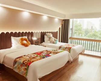 Hai·Tang Hotel (Jiujiang Railway Station Branch) - Jiujiang - Bedroom