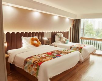 Hai·Tang Hotel (Jiujiang Railway Station Branch) - Jiujiang - Bedroom