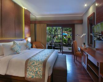 Adhi Jaya Hotel - Kuta - Bedroom