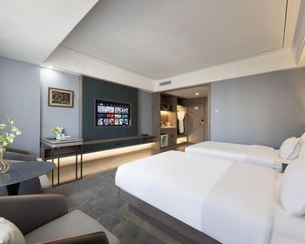 Xinhaiwan Hotel - Chifeng - Bedroom